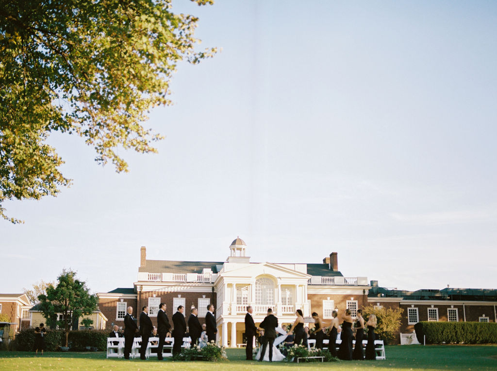 Ceremony with the backdrop of philadelphia cricket club luxury wedding venue philadelphia pa